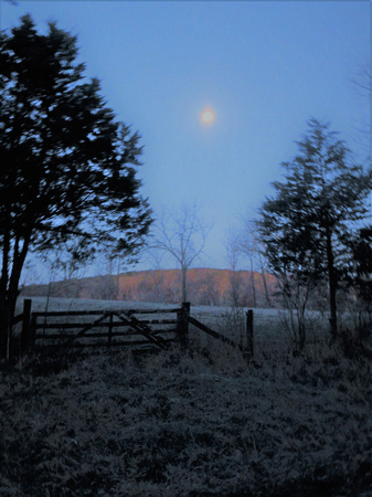 MOON SET OVER OLD WOODEN GATE NEAR PECK RANCH AREA